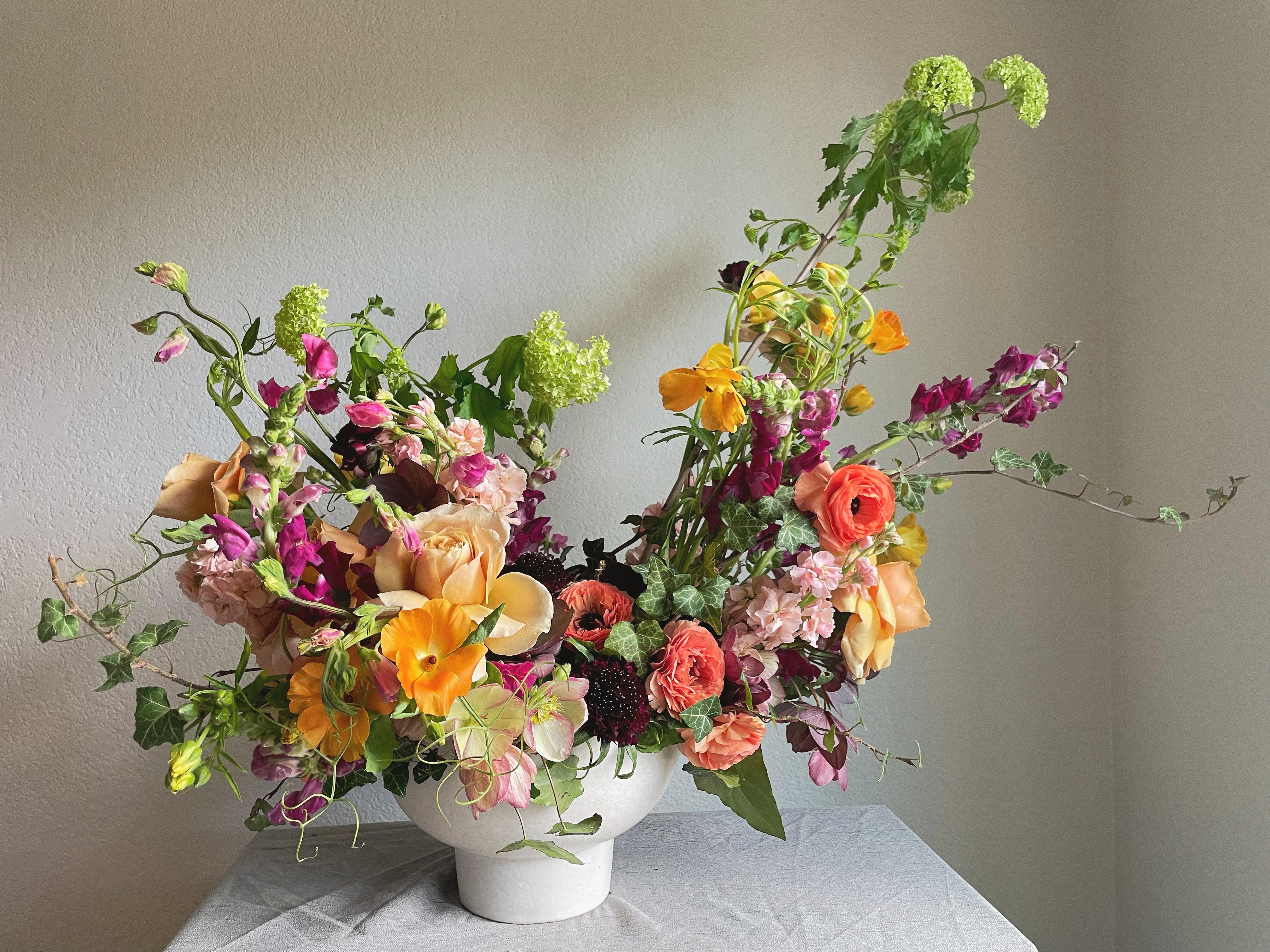 unique and artfully crafted bright and colorful wedding or event arrangement