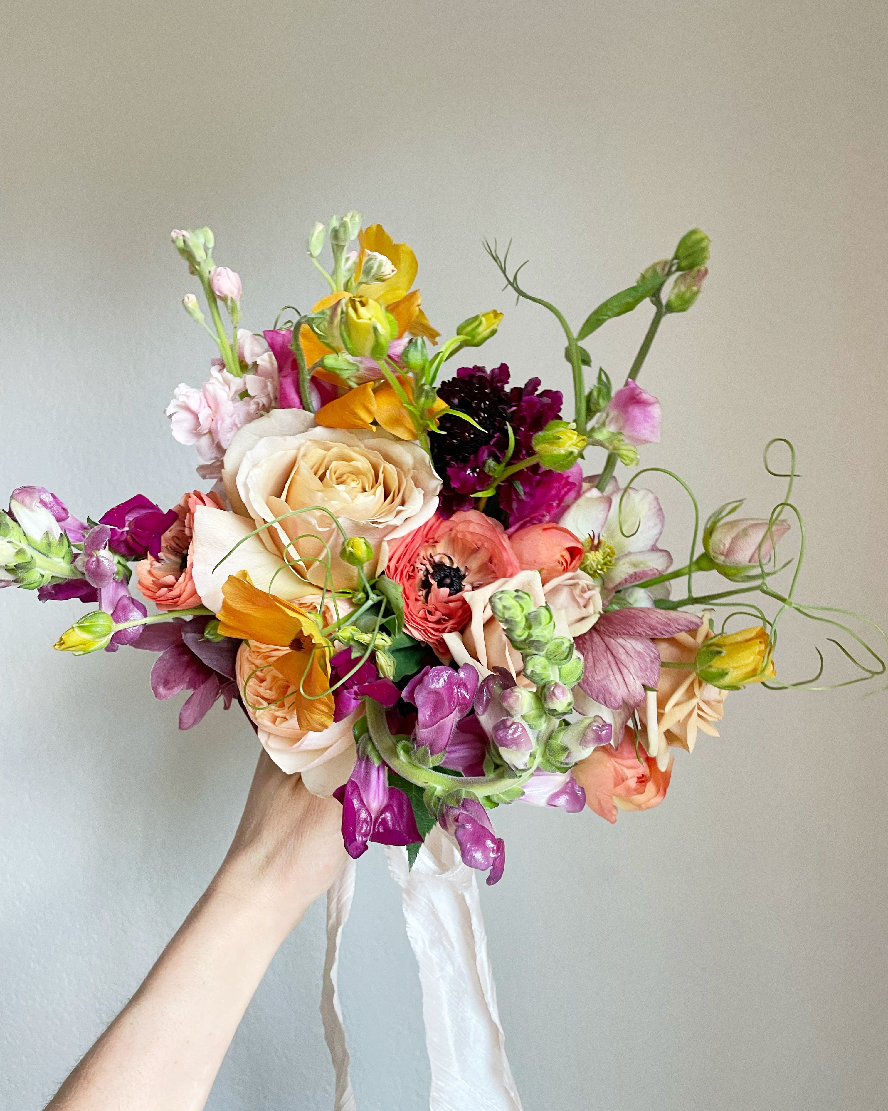 bright and colorful bridesmaid bouquet