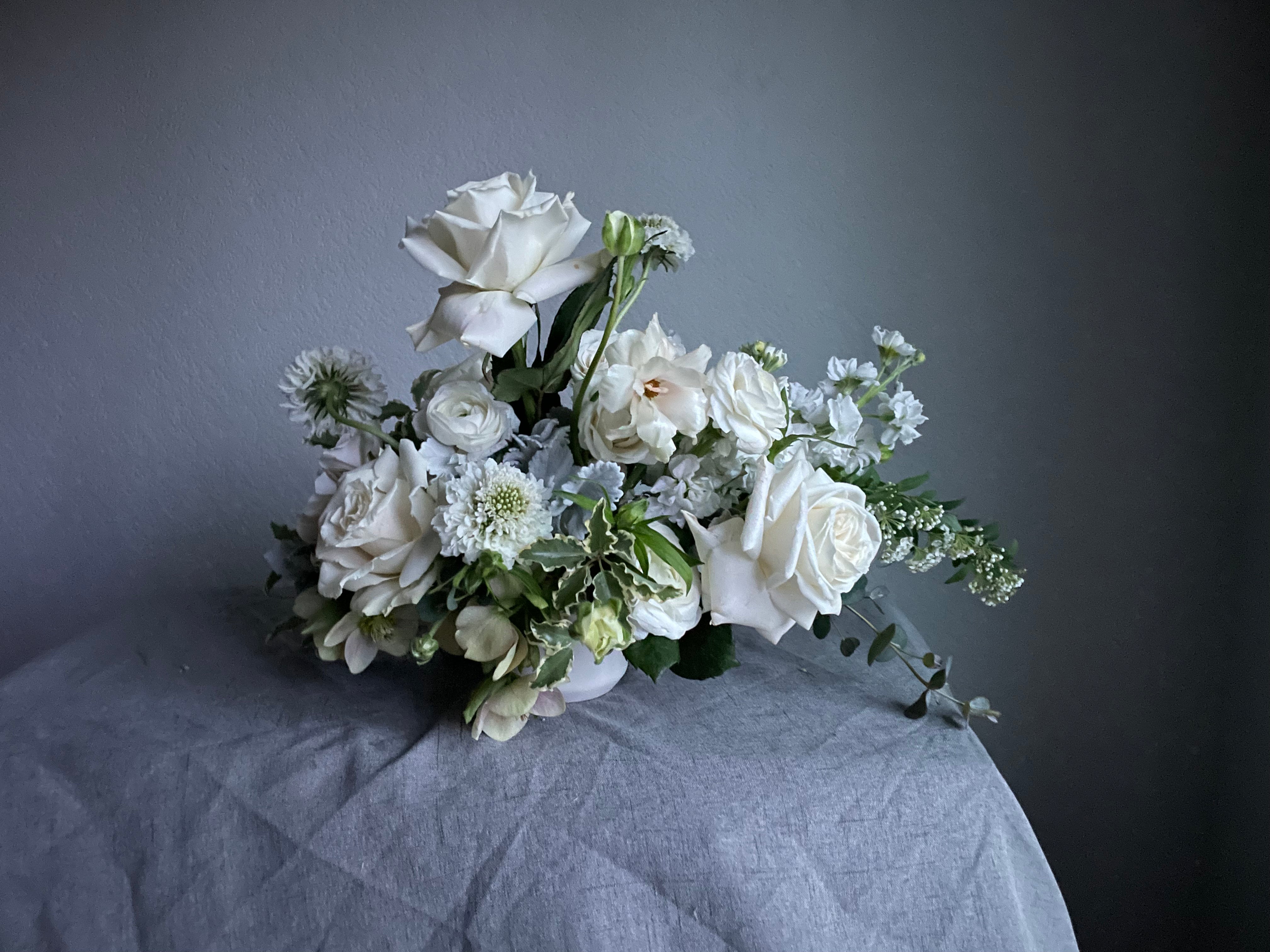 white and green vase arrangement perfect for your wedding, elopement or celebration