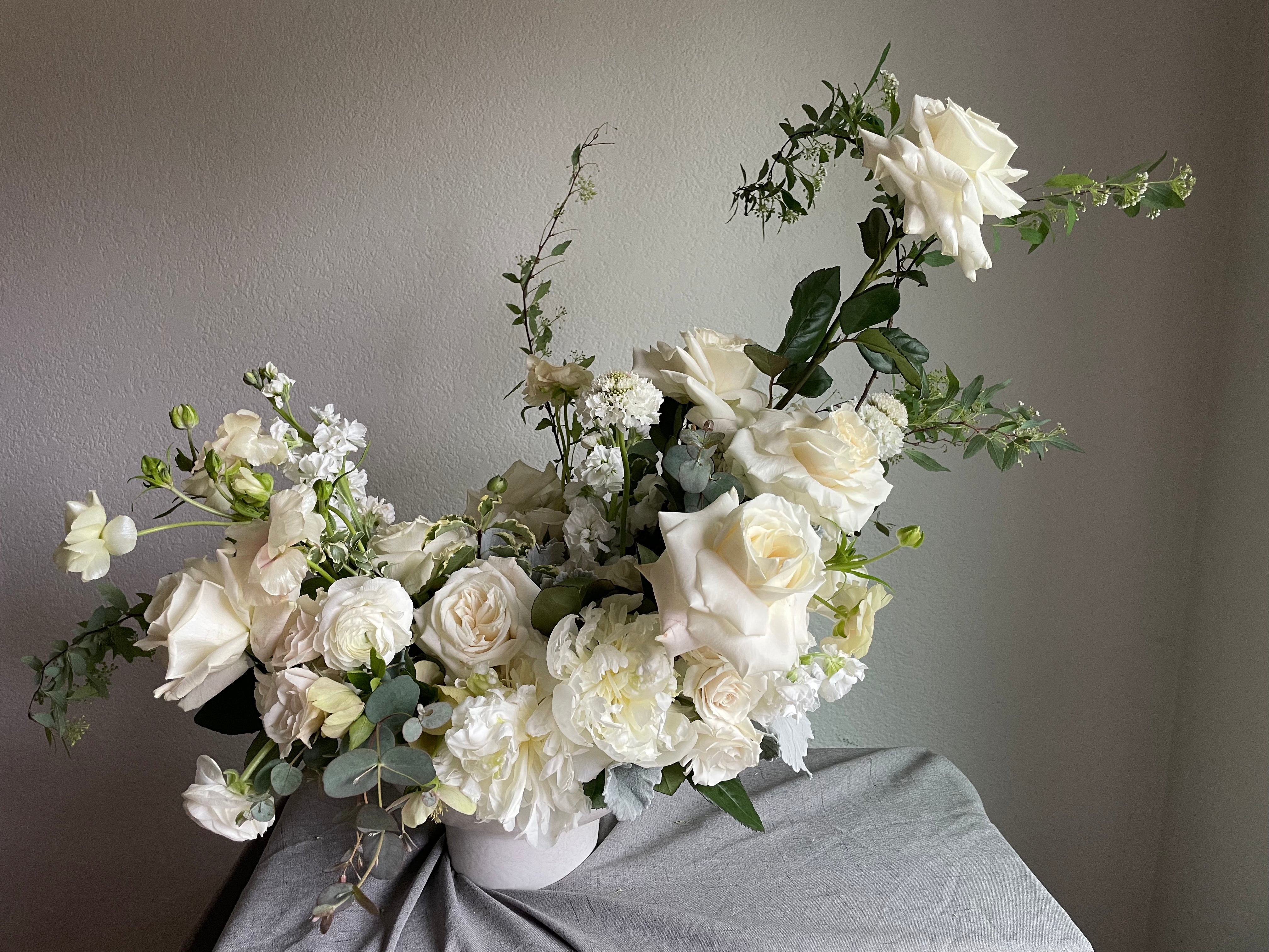 classic white and green arrangement perfect for weddings and events
