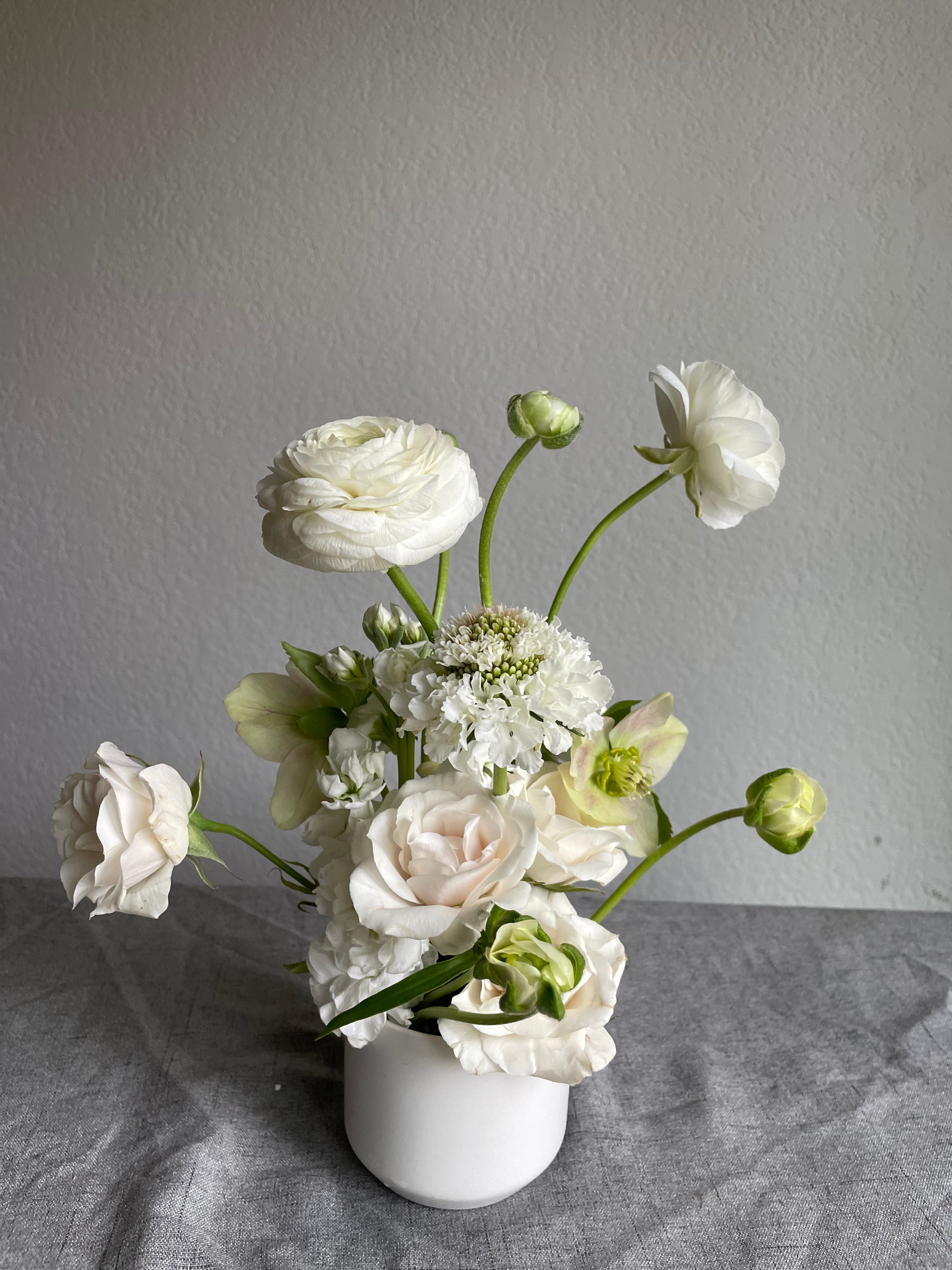 classic white and green seasonal floral arrangement