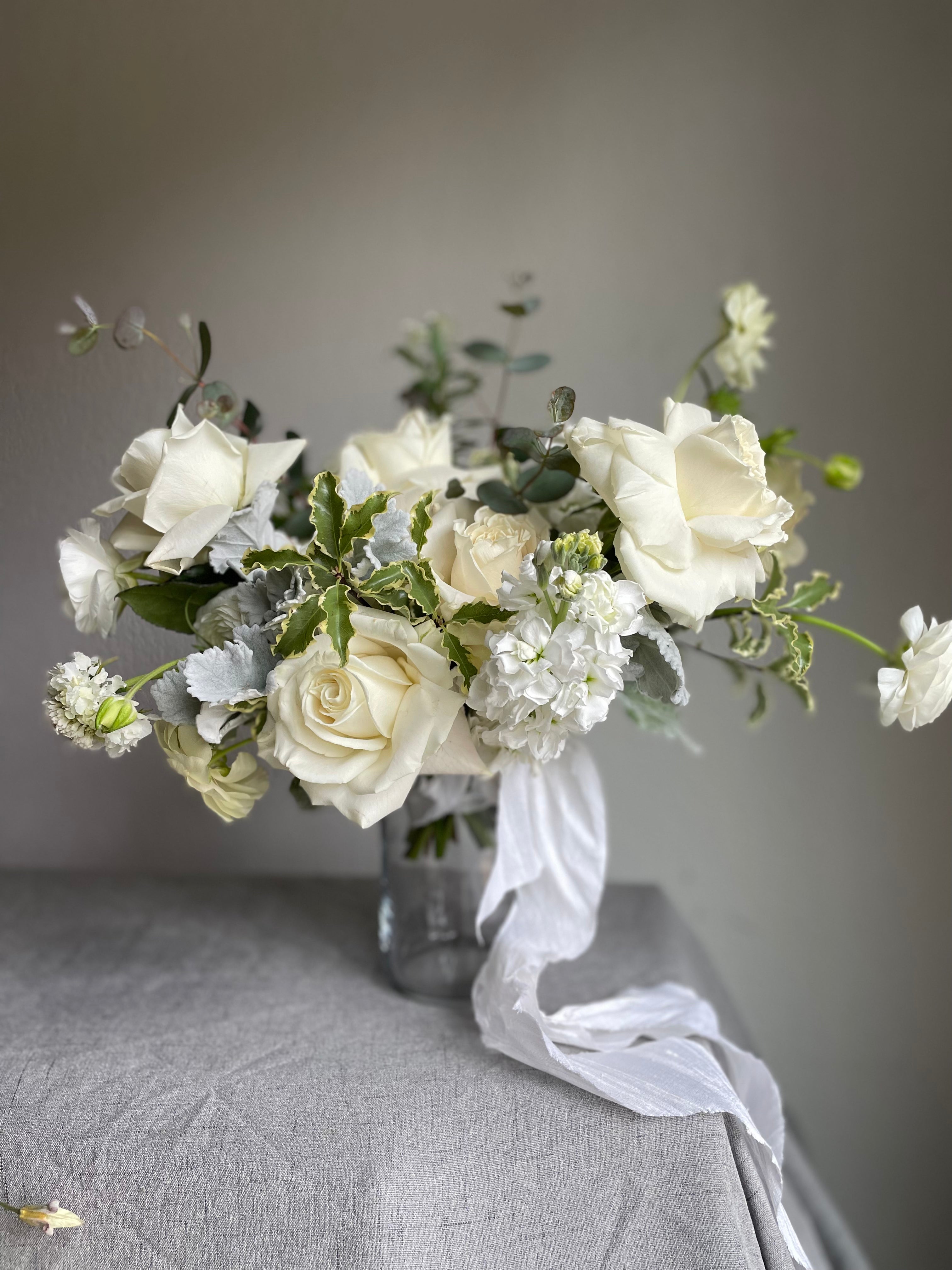 seasonal white wedding bouquet created with locally sourced flowers