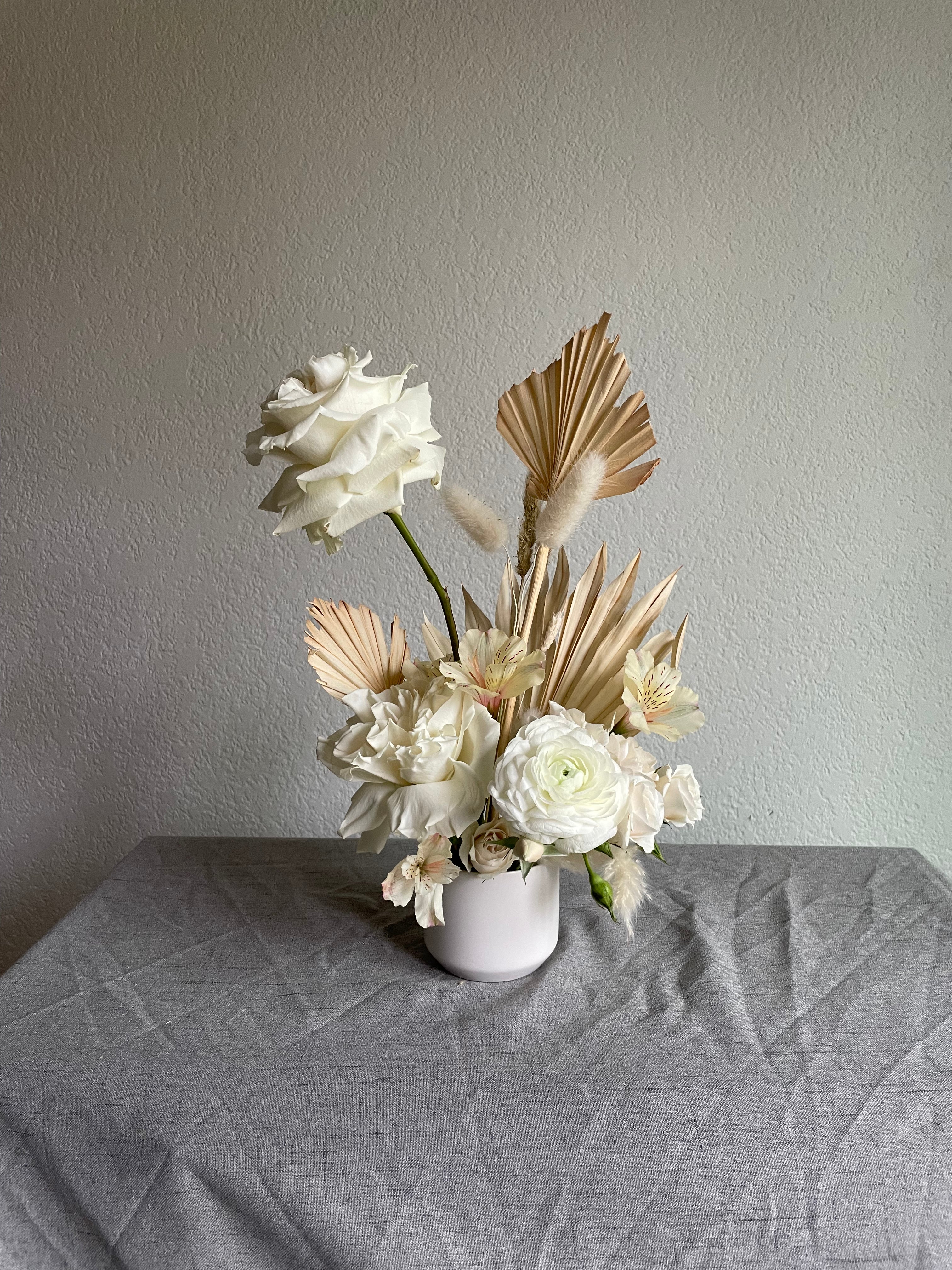 white and cream boho wedding arrangement