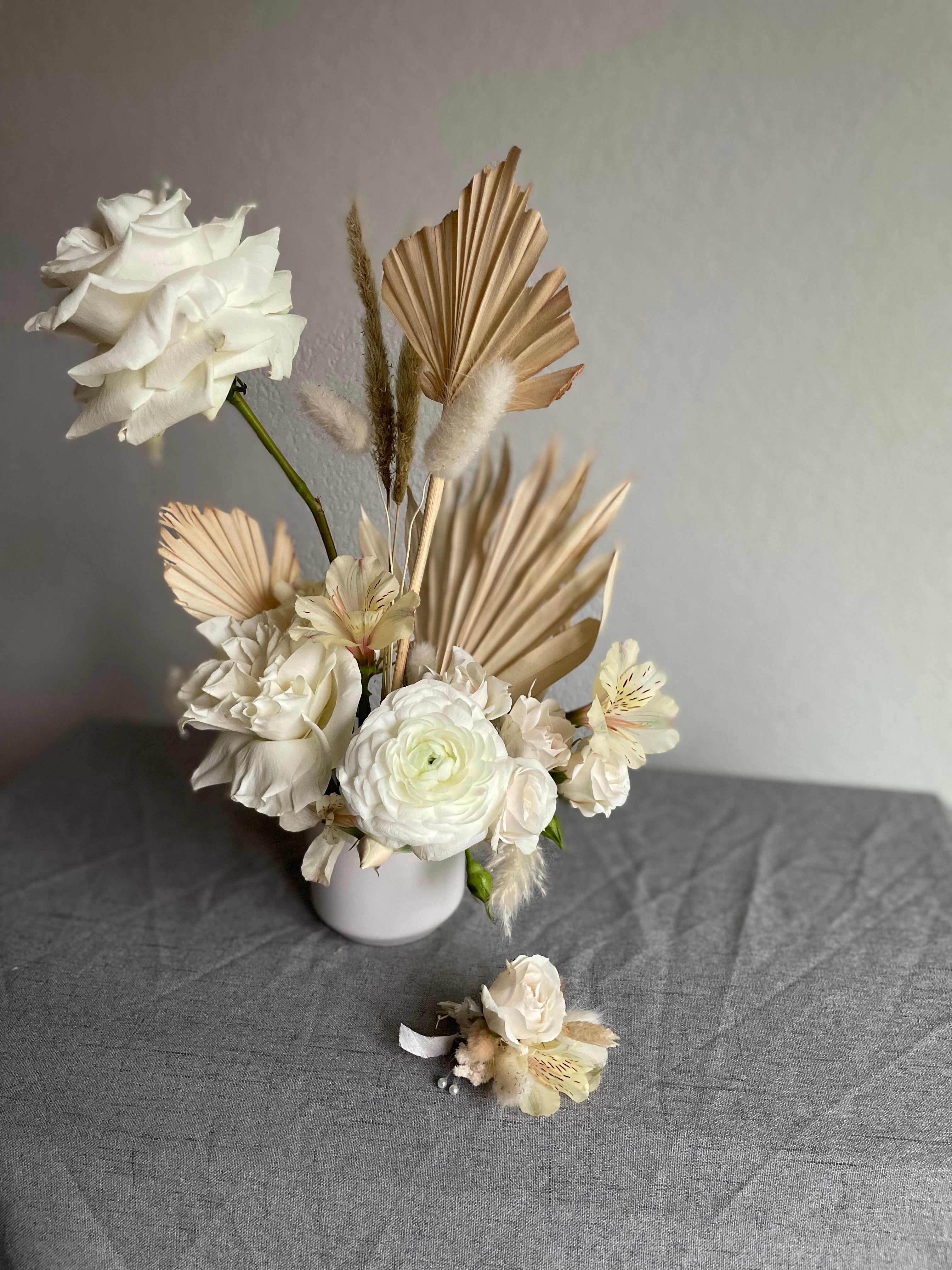 boutonniere with fresh and dried flora