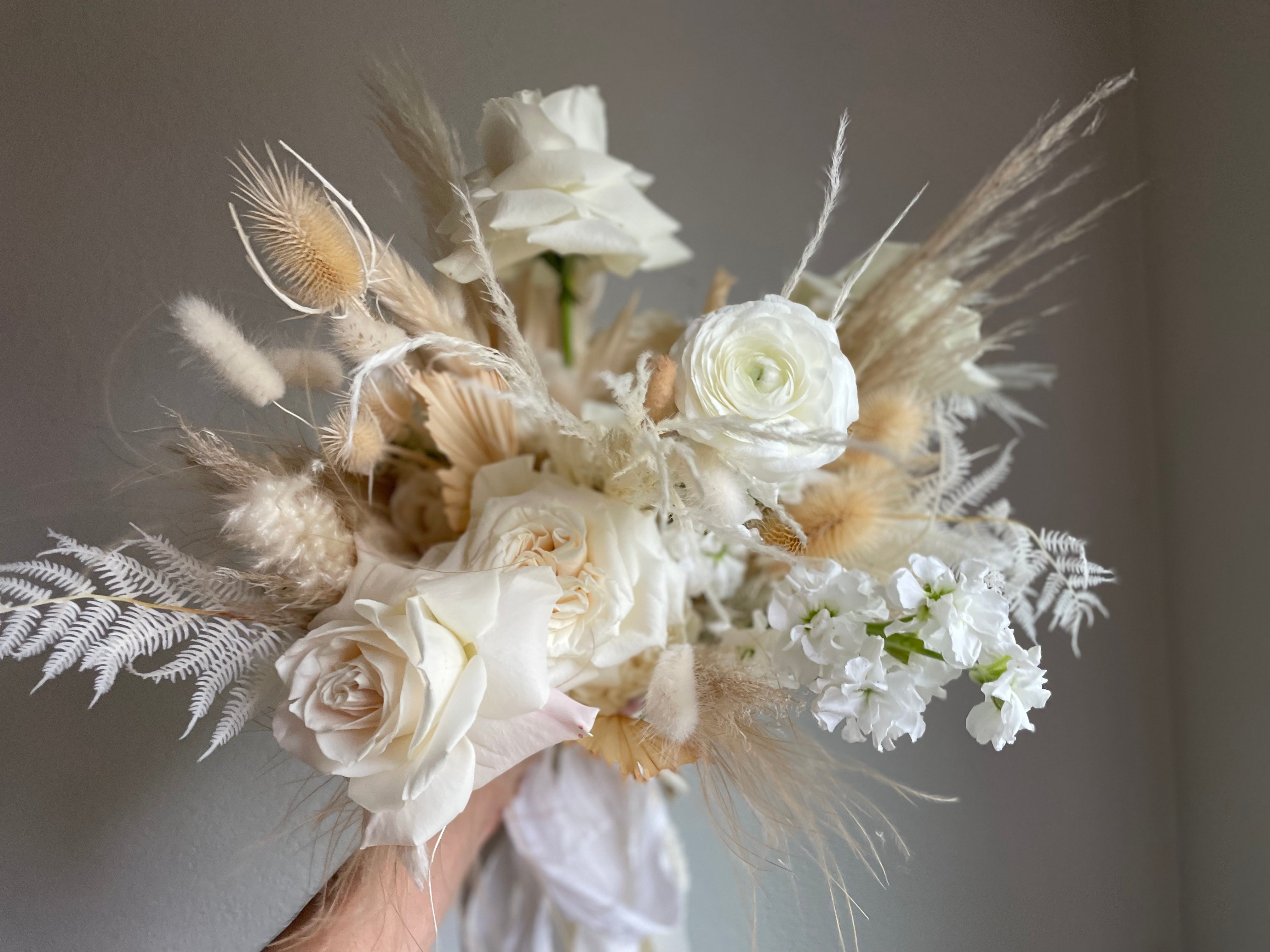 modern boho wedding bouquet with dried and fresh flora